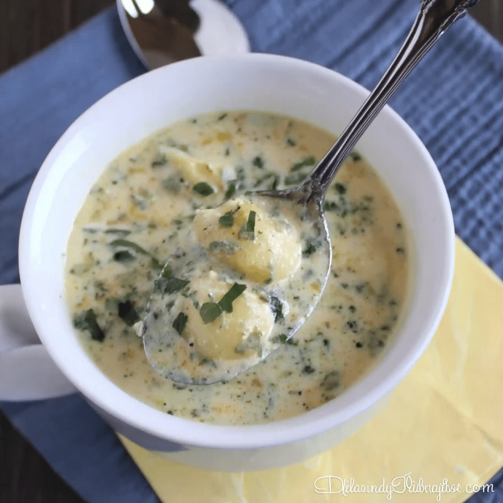 Quick & Creamy Olive Garden Chicken Gnocchi Soup in a rustic bowl