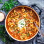Lasagna Soup with ricotta and mozzarella topping