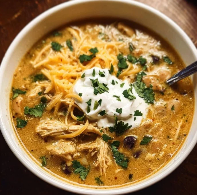Instant Pot white chicken chili served in a bowl with toppings